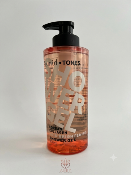A web-optimized product image of Bismid Tones Korean Collagen Skin Brightening Shower Gel in an 800ml clear pump bottle showing the peach-colored liquid inside, with the Abby Collections logo watermarked at the bottom against a clean studio background.